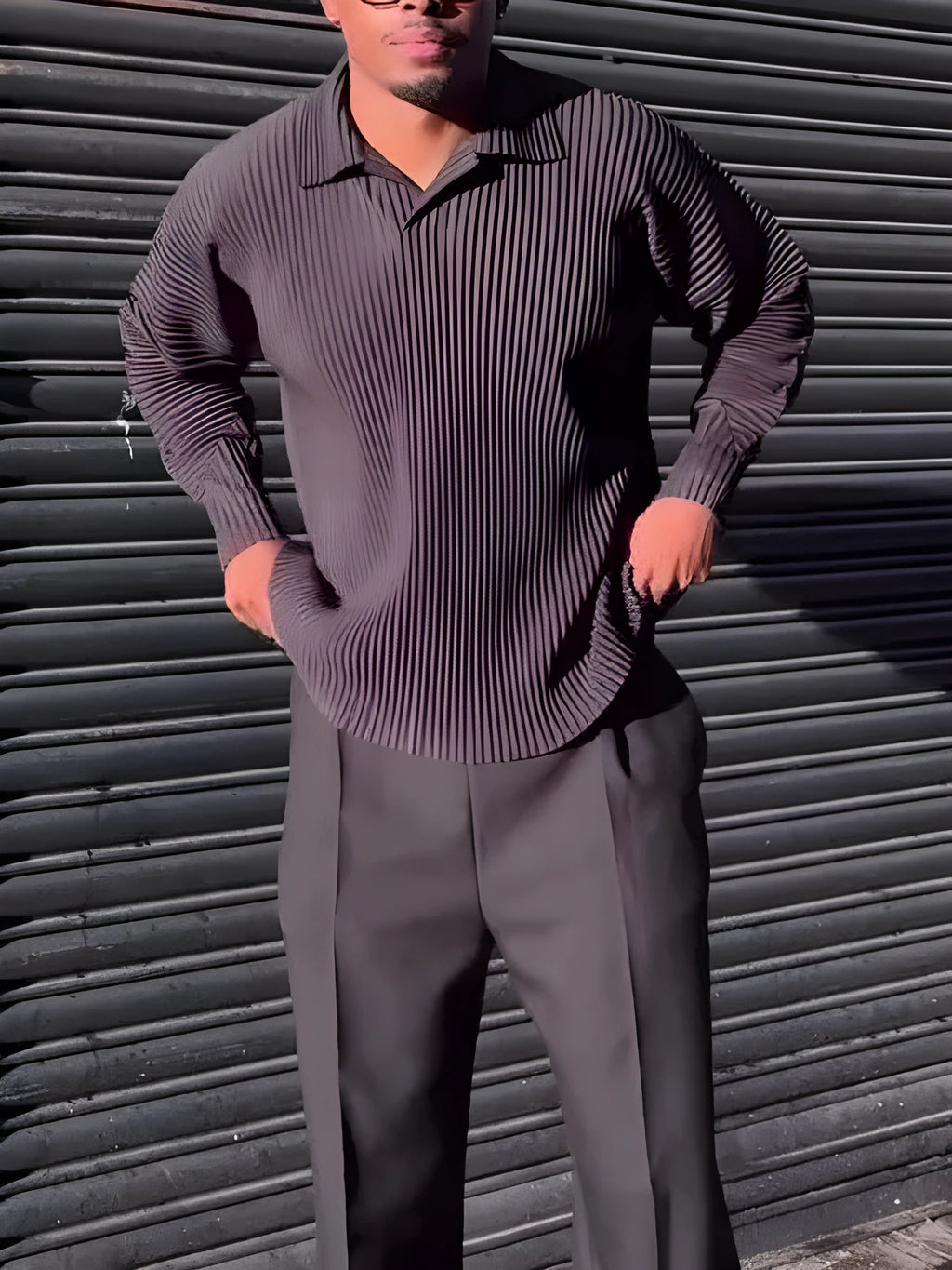 Black men's long-sleeved casual top with pleated detail on the sleeves.