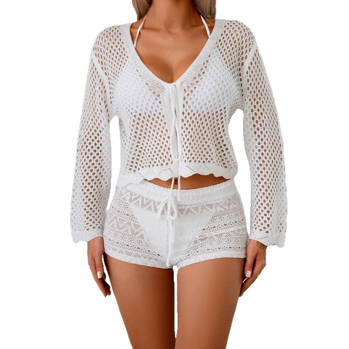 Short apricot hollow woven women's cardigan blouse with bell sleeves laid flat.
