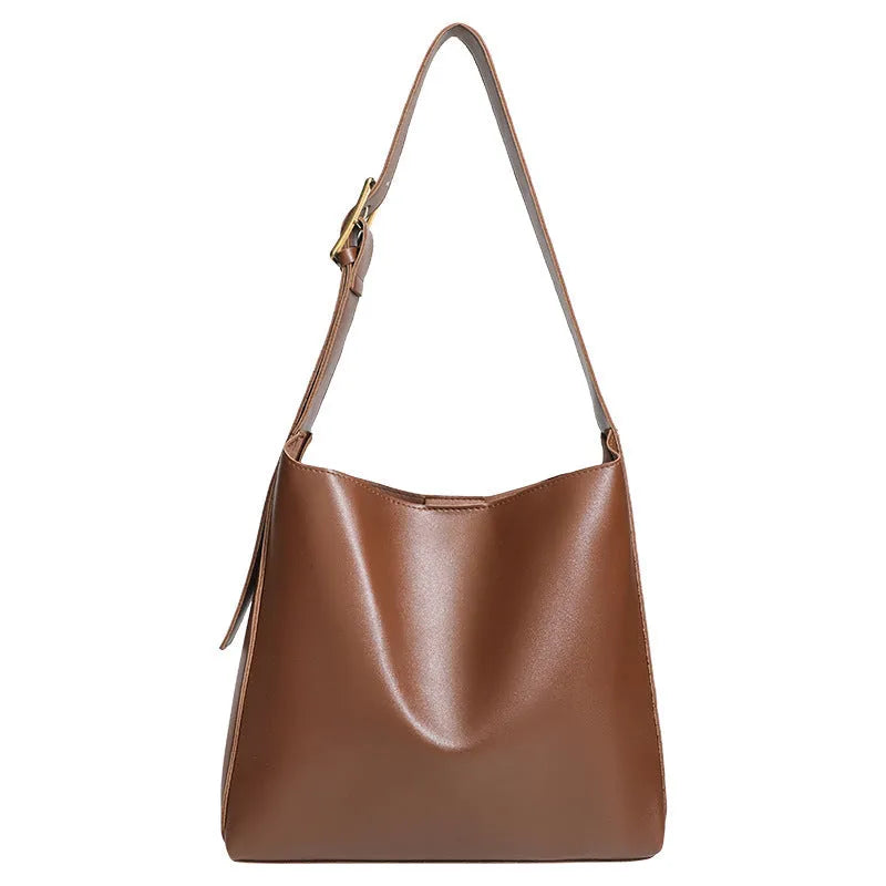 Retro textured Maillard tote bag in brown PU with visible sewing thread detailing and three-dimensional outer pocket