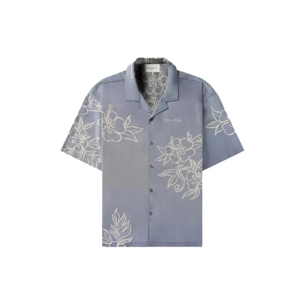 Men's loose-fit short-sleeve top with floral print in a light colour, shown on a hanger.