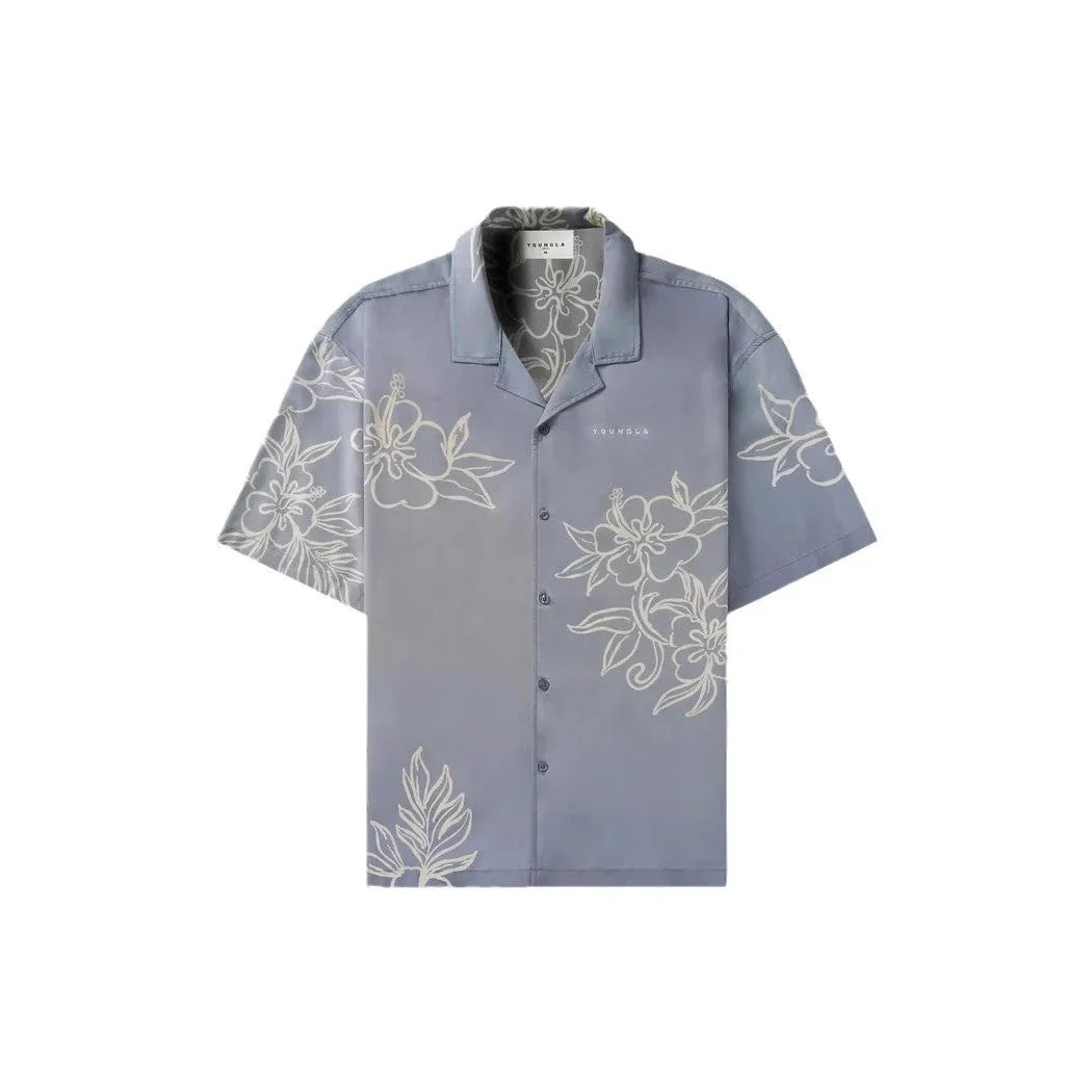 Men's loose-fit short-sleeve top with floral print in a light colour, shown on a hanger.