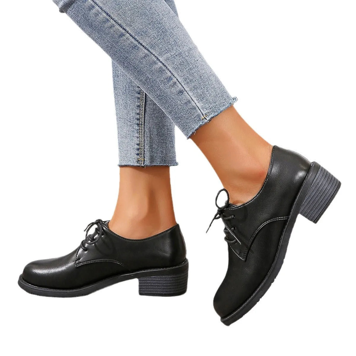 Black women's work shoes with thick rubber heel and soft sole, low top design with European styling