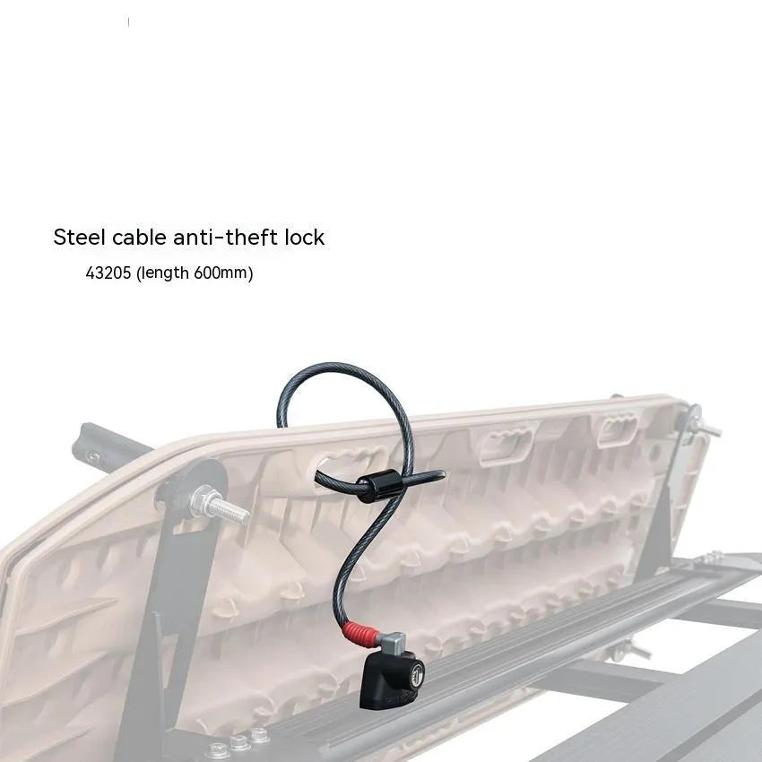 Steel cable fixed lock with plastic-sheathed cables for securing equipment on a vehicle roof platform.