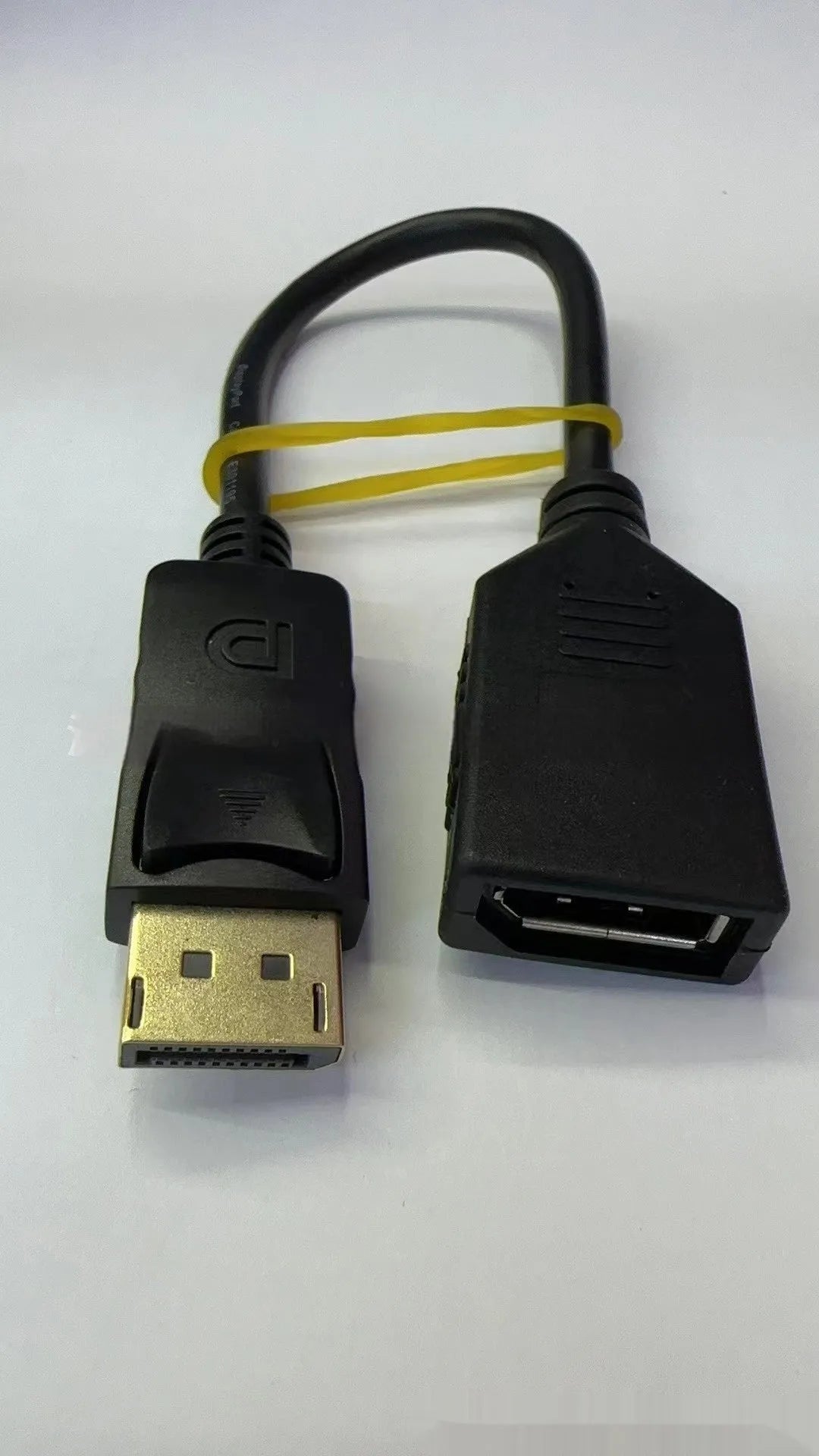 Black DisplayPort male to female extension cable approximately 10cm long with rotating connector