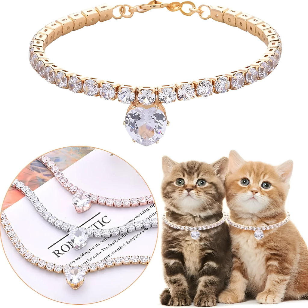 Gold heart-shaped rhinestone dog collar with sparkling stones and a metal clasp.