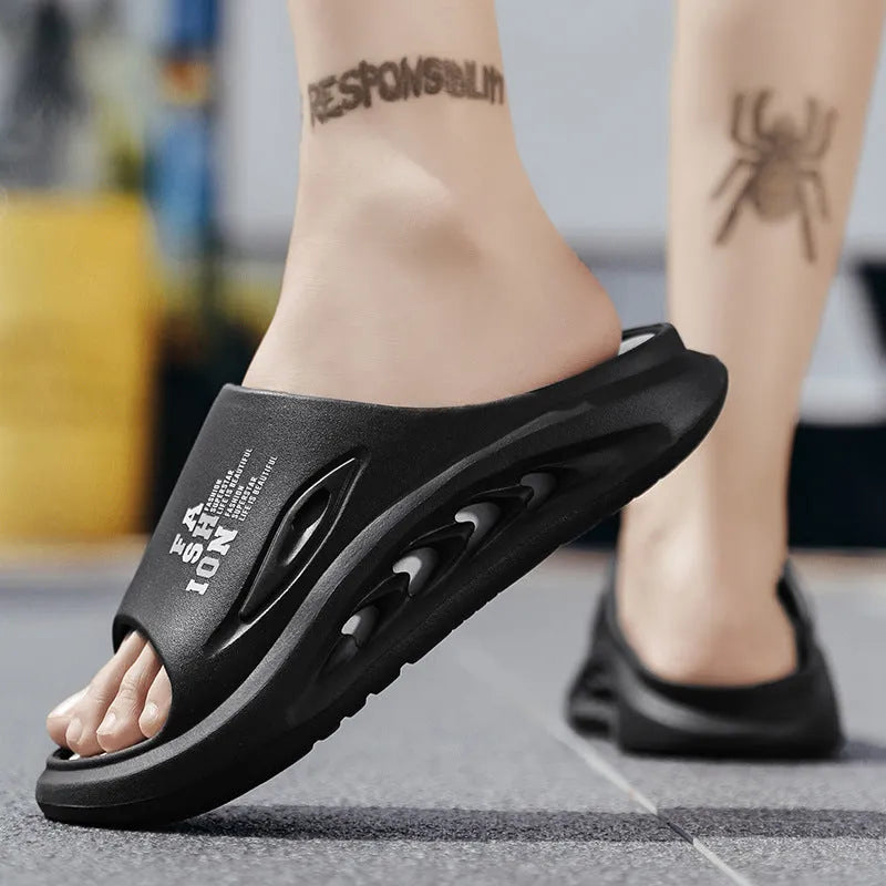 Men's white and green EVA sports slippers with a thick colour-blocked sole.
