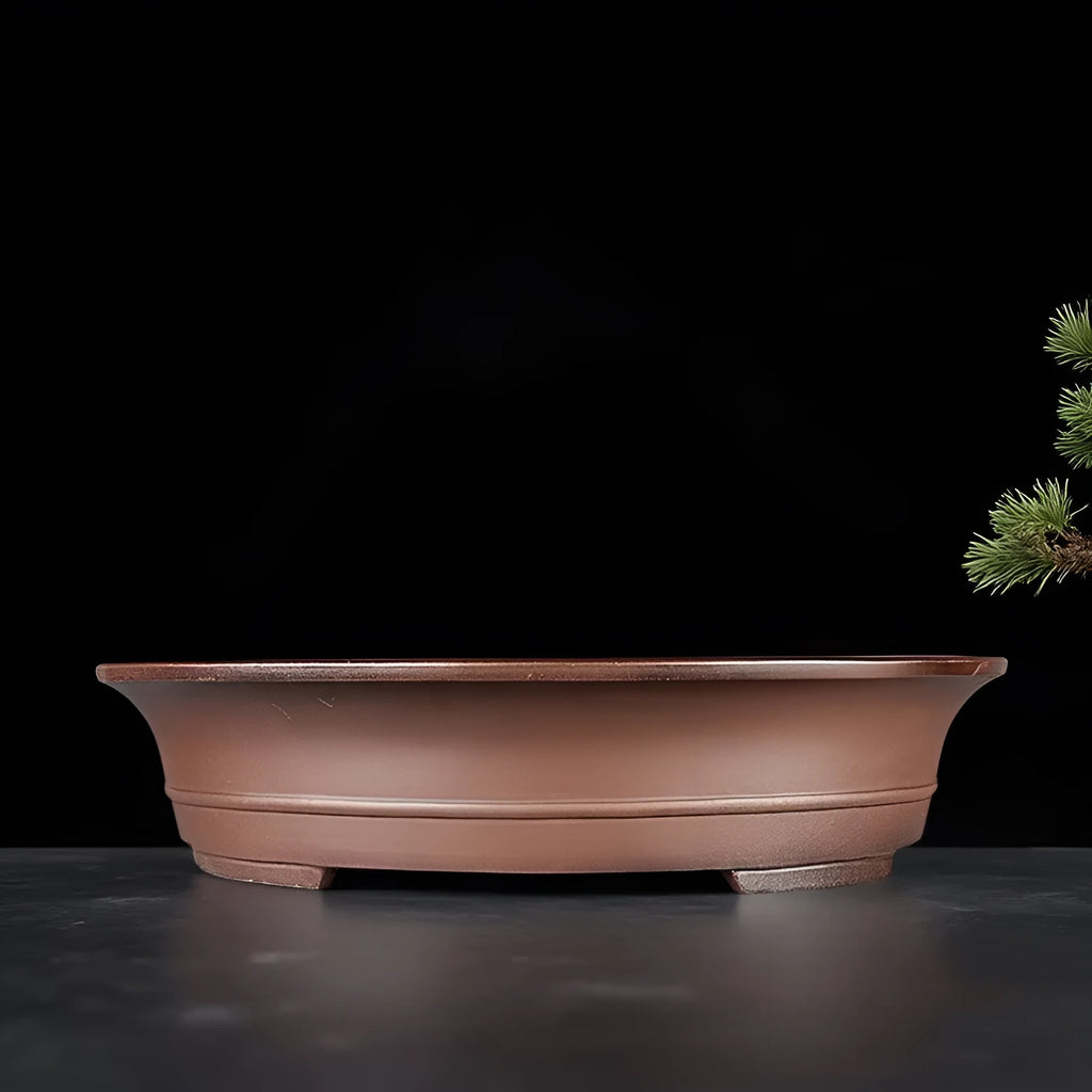 Handmade antique oval Yixing Purple Mud bonsai pot with dimensions 66x53x14.5cm for pine and cypress