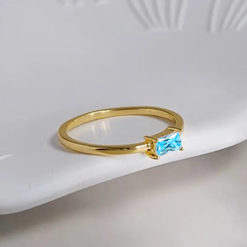 Copper bracelet ring with zircon micro inlay detailing, geometry shape, and love heart elements.