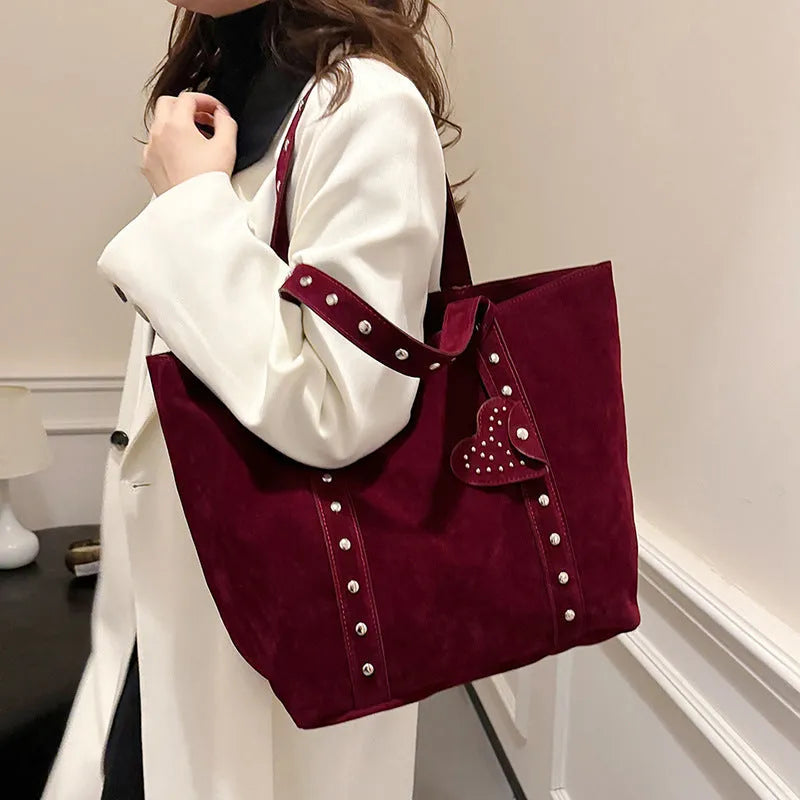 PU tote bag with double shoulder straps in black showing horizontal square shape and sandwich pocket exterior