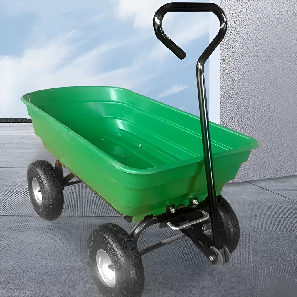 Green four-wheel plastic dump truck with a large cargo bed, shown on grass.