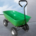 Green four-wheel plastic dump truck with a large cargo bed, shown on grass.