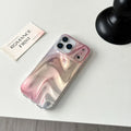 Double shell iPhone case in IMD silver pink satin pattern with water ripple smudge design