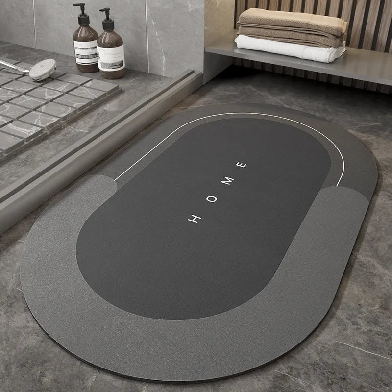 Cushioned bathroom floor mat with non-slip backing in blue colour showing oval shape on bathroom tiles
