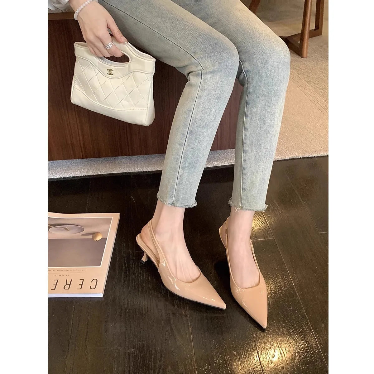 Women's pointed-toe mid heel stiletto pumps in nude or black microfiber, sizes 34-42, shallow mouth design