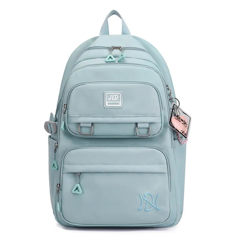Large capacity nylon school backpack for girls in a choice of colours and geometric patterns.