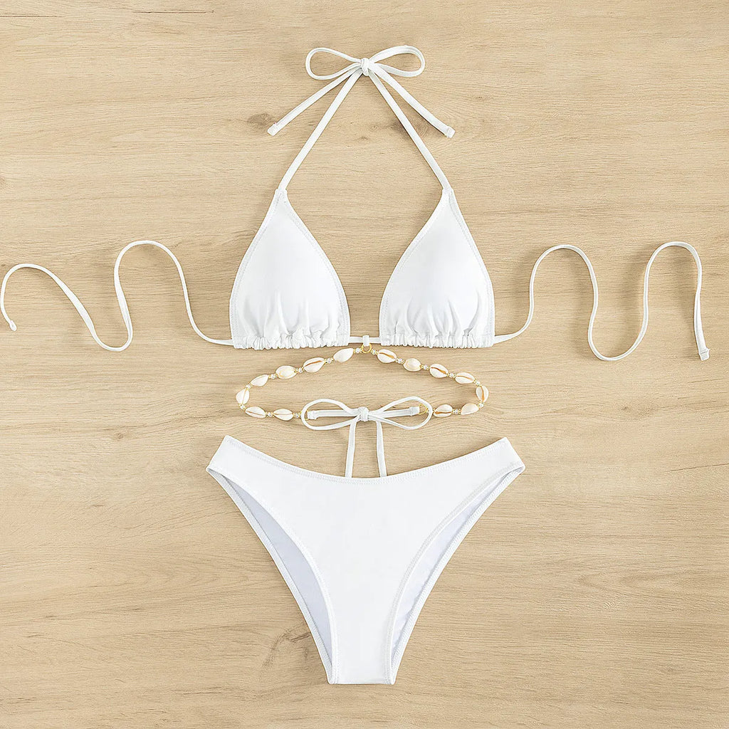 Women's halter bikini with lace-up front in solid colour for swimming