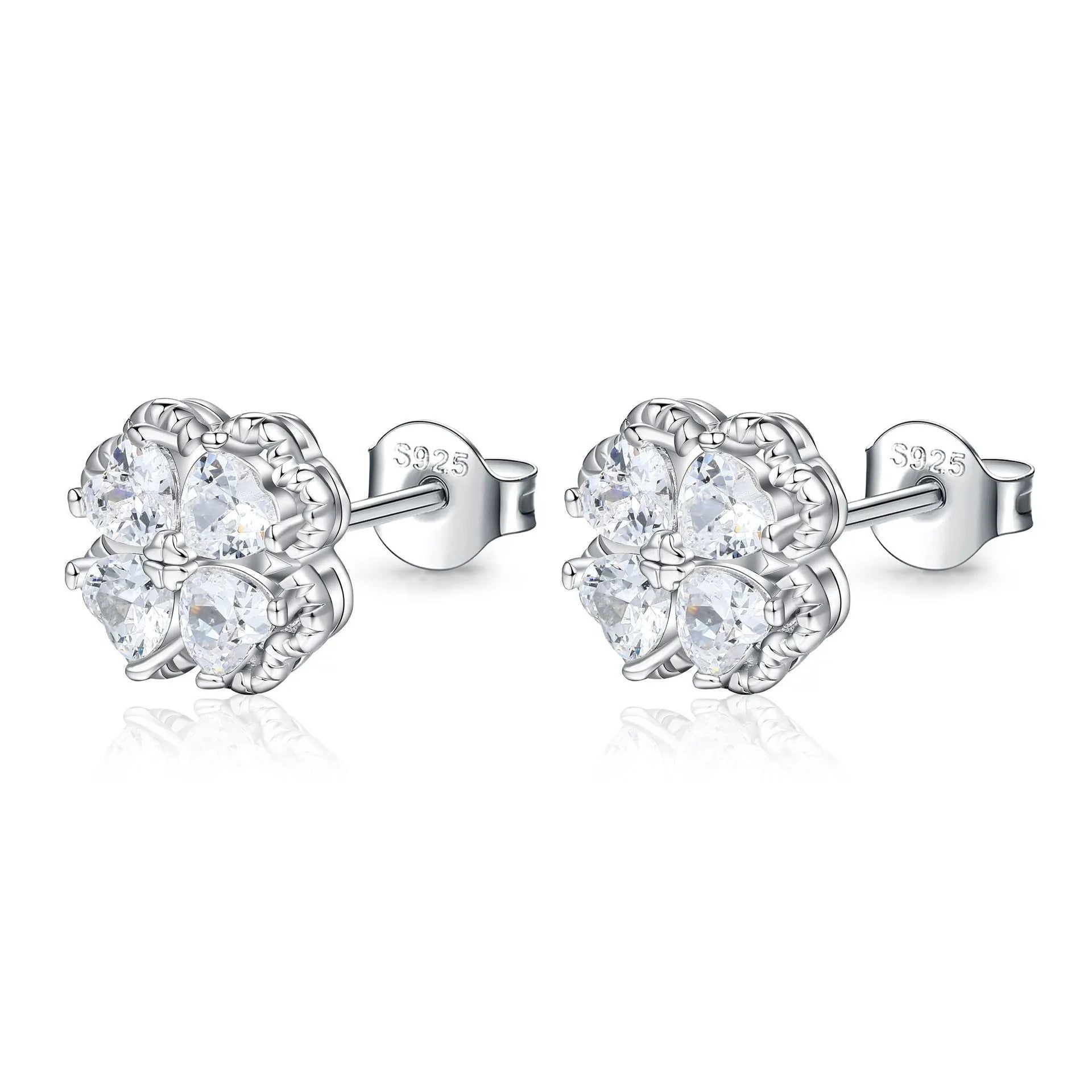 A pair of 925 silver four-leaf clover earrings with zircon stones in a heart-shaped setting.