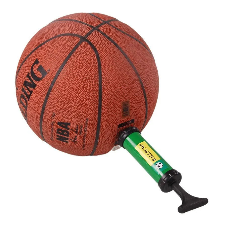Mixed colour plastic manual hand pump for inflating basketballs, footballs, and balloons.