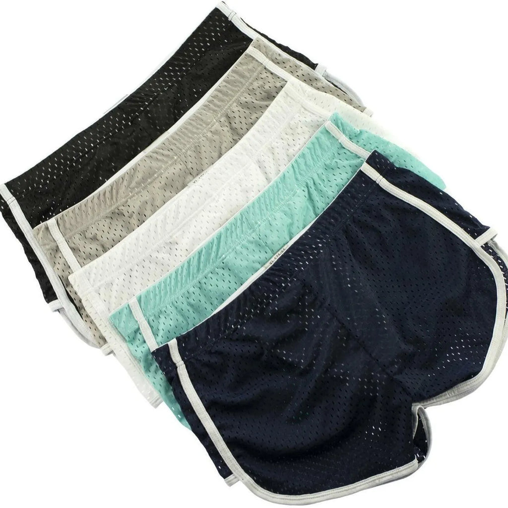 Men's solid-colour three-point boxer shorts laid flat, showing mid-waist band and three-point fly design.