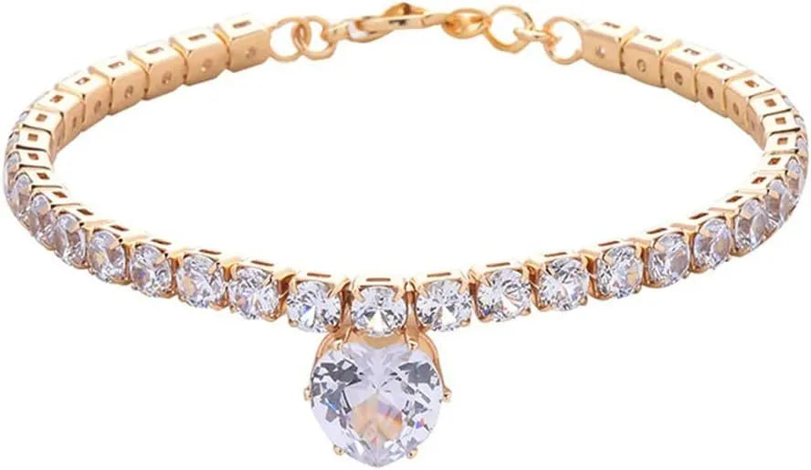 Gold heart-shaped rhinestone dog collar with sparkling stones and a metal clasp.