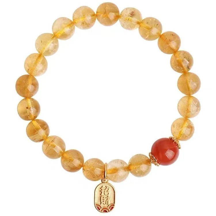 Polished natural red agate beaded bracelet showing stone texture and bead proportion