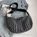 Women's ethnic style canvas dumpling crossbody bag showing sewing thread details and large capacity design