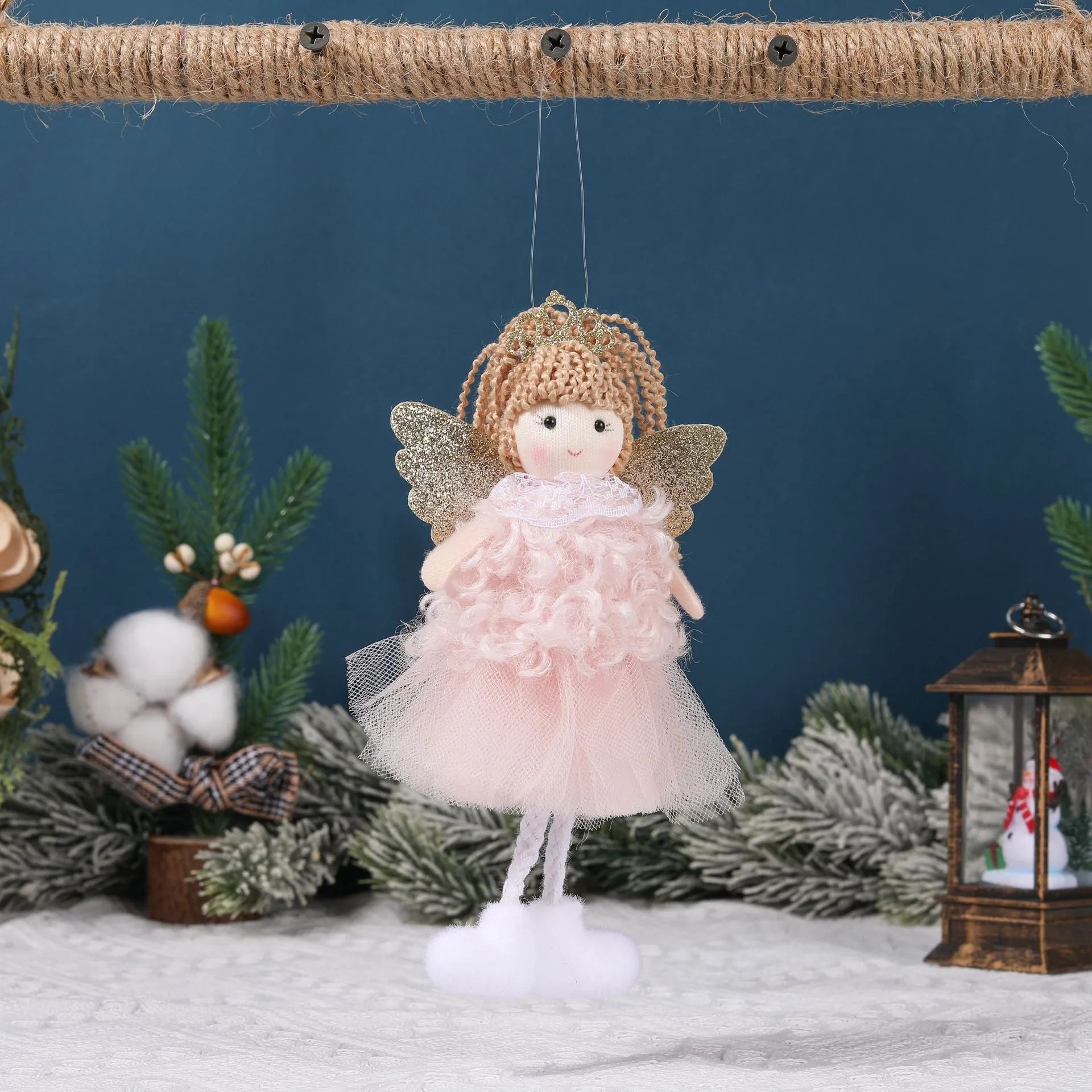 Girl's fabric Christmas angel pendant crown hair clip on a high ponytail, in white, pink, or khaki.
