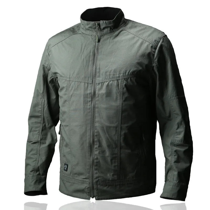 Man wearing a brown tactical jacket with multiple pockets and a plaid camouflage pattern, suitable for outdoor use.