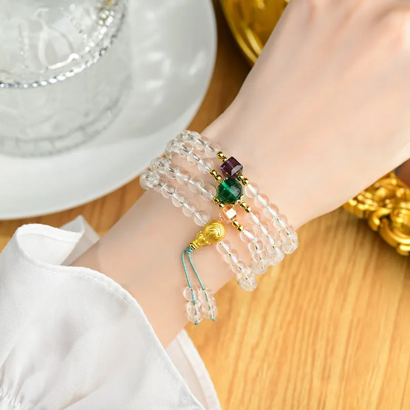 White crystal 108 bead rosary bracelet with geometric ethnic design
