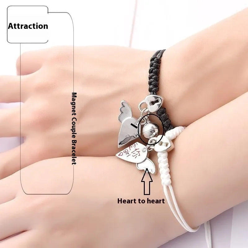 Magnetic couple bracelet set with electroplated alloy construction and various charm designs