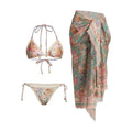 Women's creamy-white floral bikini swimsuit with separate top, underwear, and skirt pieces