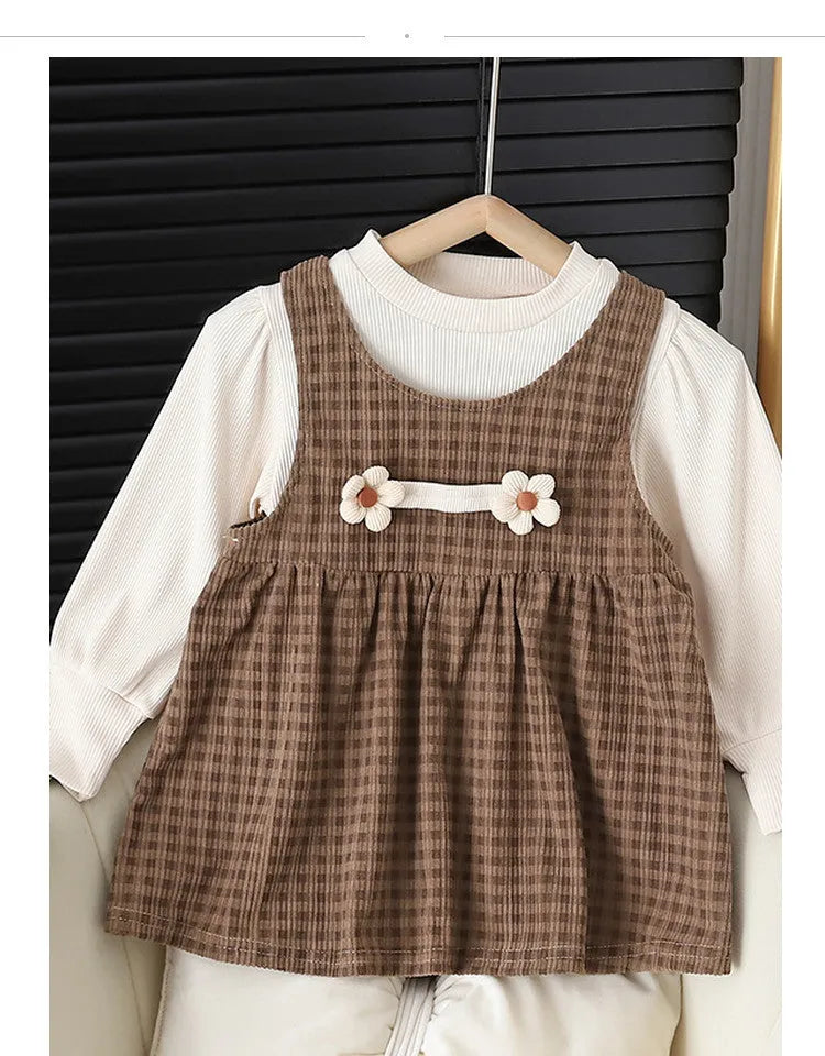 Baby girl wearing a dark coffee plaid Korean style long-sleeved dress suit with shirt.
