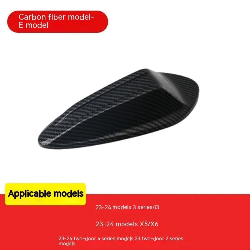 BMW shark fin antenna cover in carbon fibre and piano black finishes for Types A, B, and E.