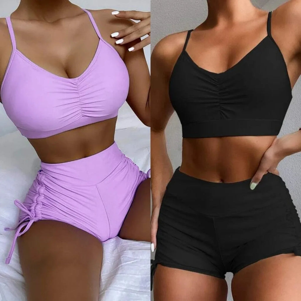 A purple high-waist split swimsuit for women, showing the bikini briefs style and sleeveless design.