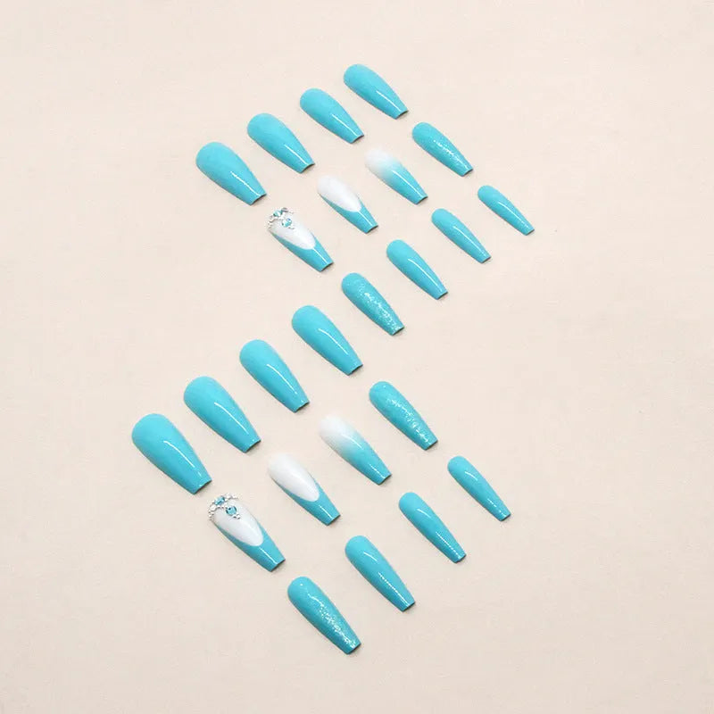 Long ballet shaped artificial nail patches with smart blue diamond pattern on solid blue background
