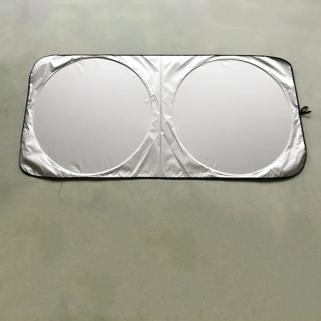 Large silver reflective car sunshade measuring 190cm by 90cm, shown folded next to its cloth storage bag.
