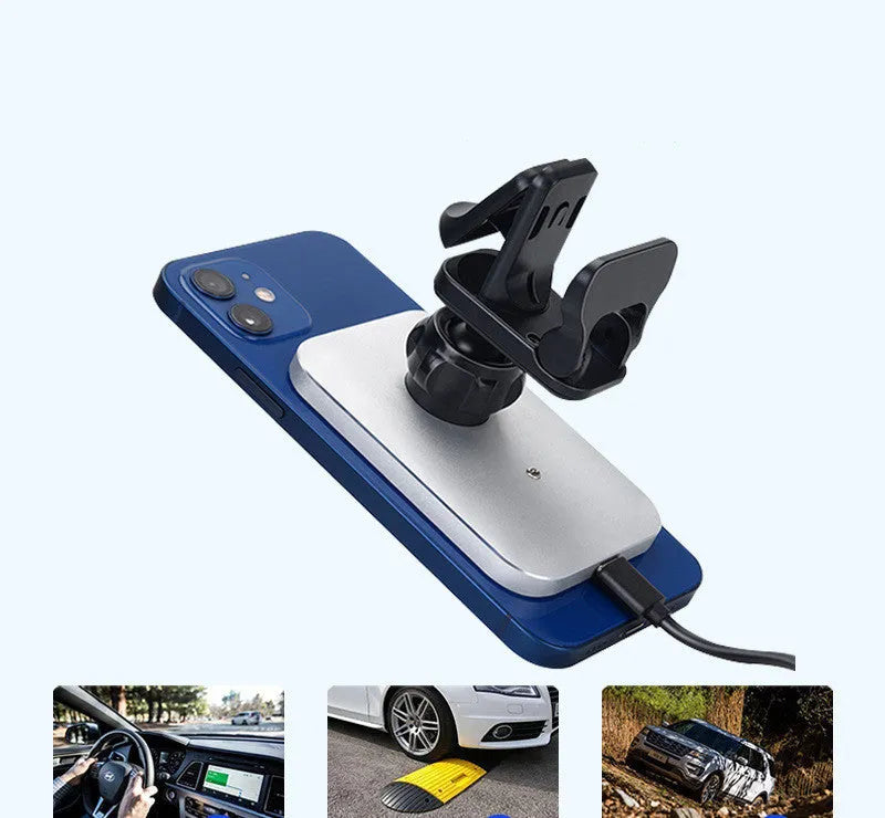 Black magnetic wireless charging car phone holder mounted on car dashboard with iPhone 12 attached