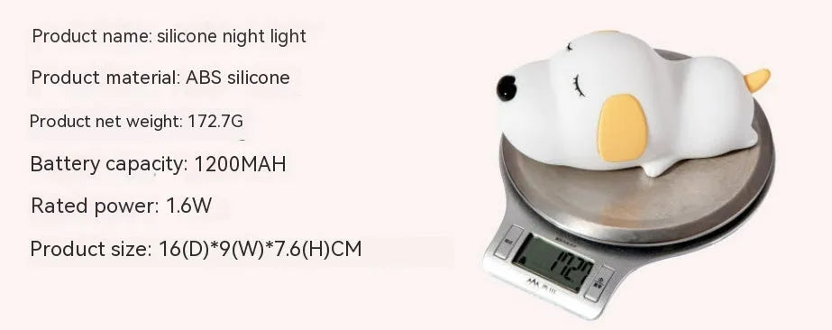 Silicone cartoon dog night light with two colours and a USB cable.