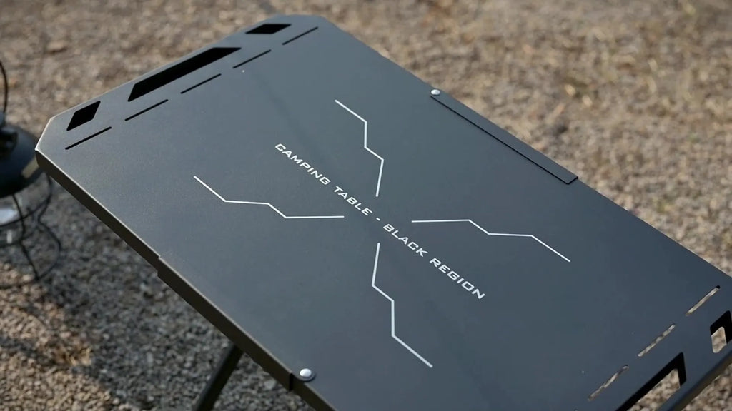 Black folding outdoor camping table made of stainless steel and aluminium, 600 x 350 x 375mm size