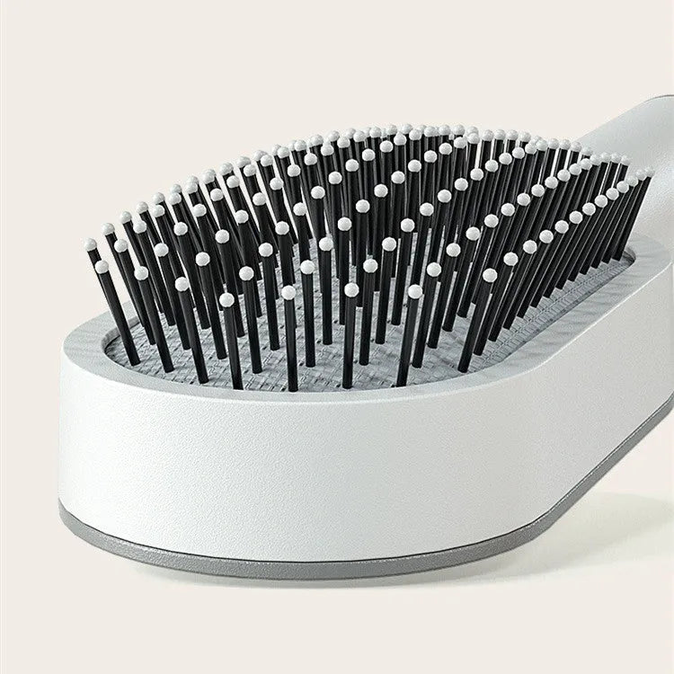 Self-cleaning hair brush with air cushion design and one-key cleaning function in various colour options