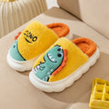 A pair of plush cotton couple slippers with dinosaur print, shown in coffee colour.