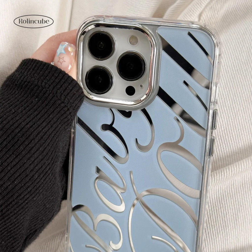 Transparent blue iPhone case with mirrored English letters and a frosted TPU finish.