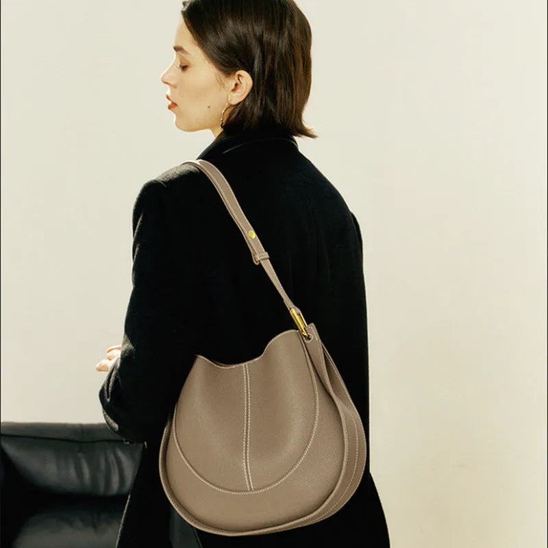 Small round genuine top grain leather crossbody bag for women with splicing design and open outer pocket