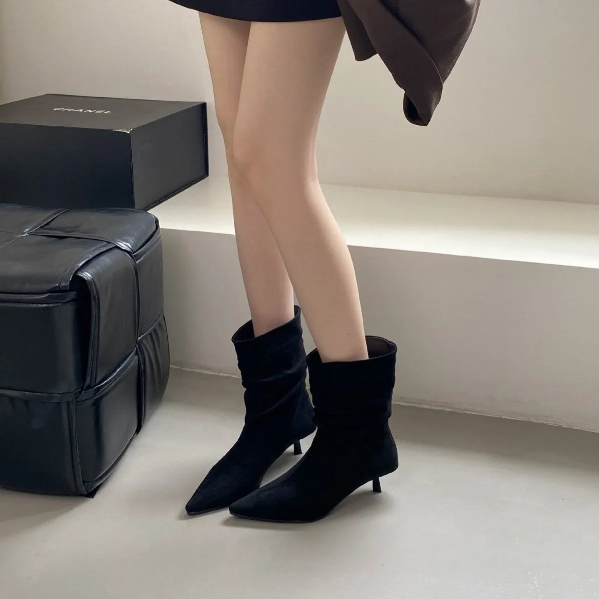 Women's pointed toe mid-calf boots with low stiletto heel, black microfiber upper, slip-on style