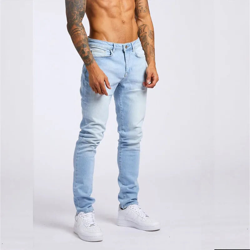 Men's slim fit high waist cotton jeans in light blue or black, sizes 28 to 36