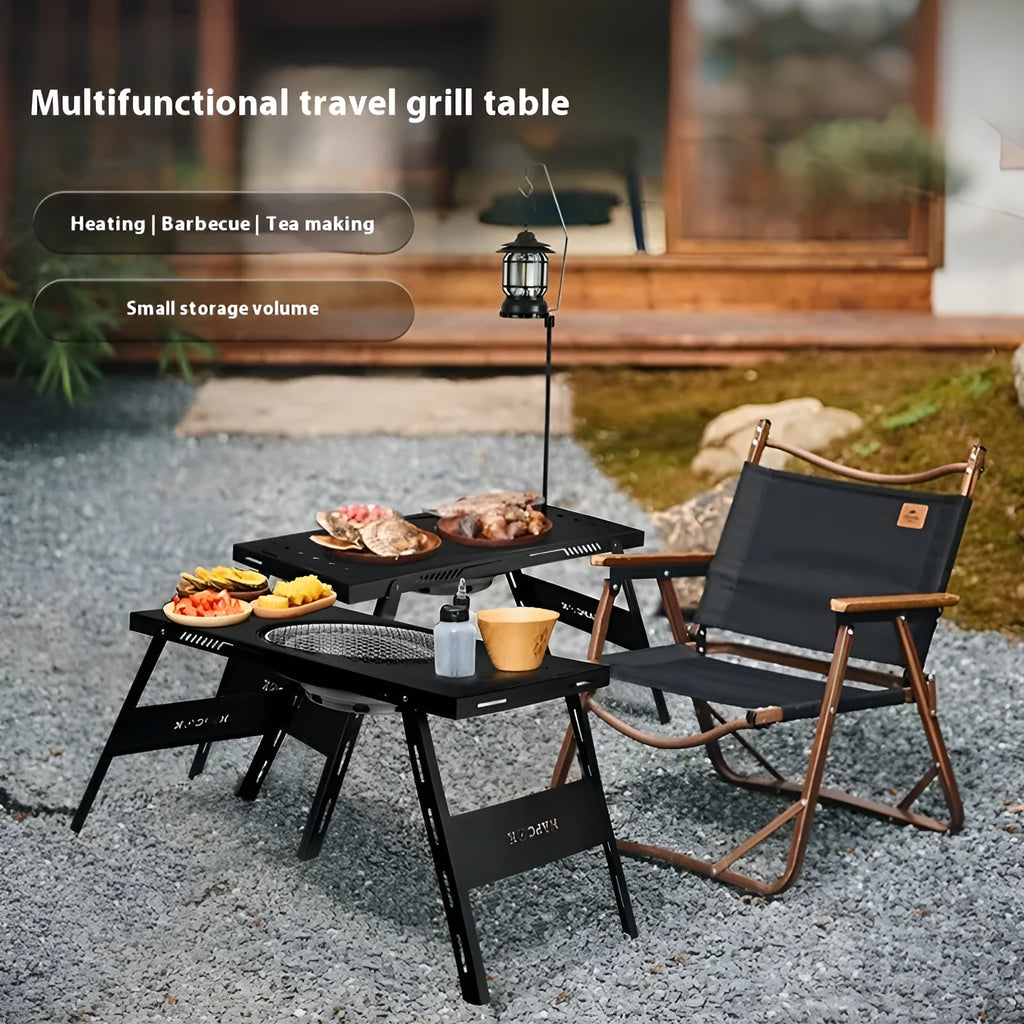 Folding black camping cooking tea table that functions as both barbecue stove and dining surface