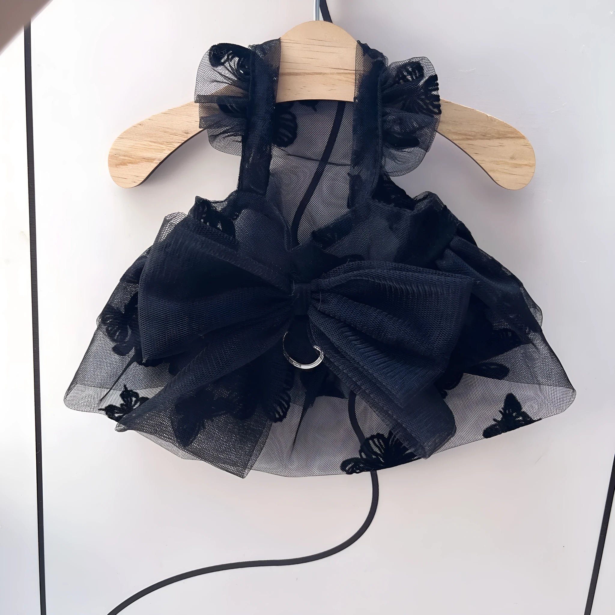 Black gauze princess tulle skirt for a small dog, showing lightweight sheer fabric and formal style.
