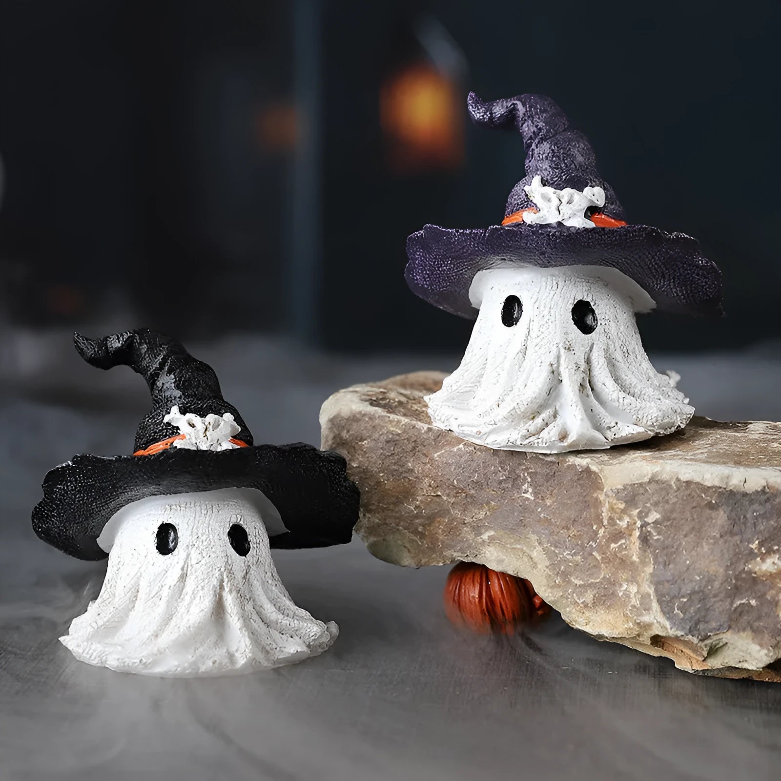 Resin Halloween wizard hat ornament in black or purple colour.