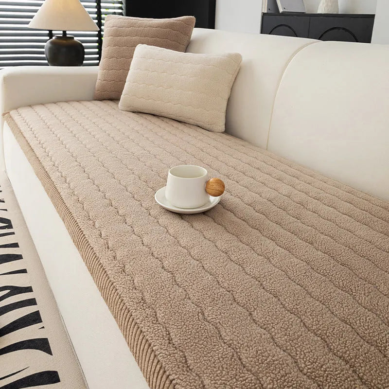 Thickened plush fleece sofa cover in beige on a couch, straight row design, dust protection cover
