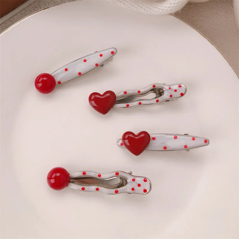 Red love heart shaped willow leaf hair clip with dots, a French retro Korean-style barrette.